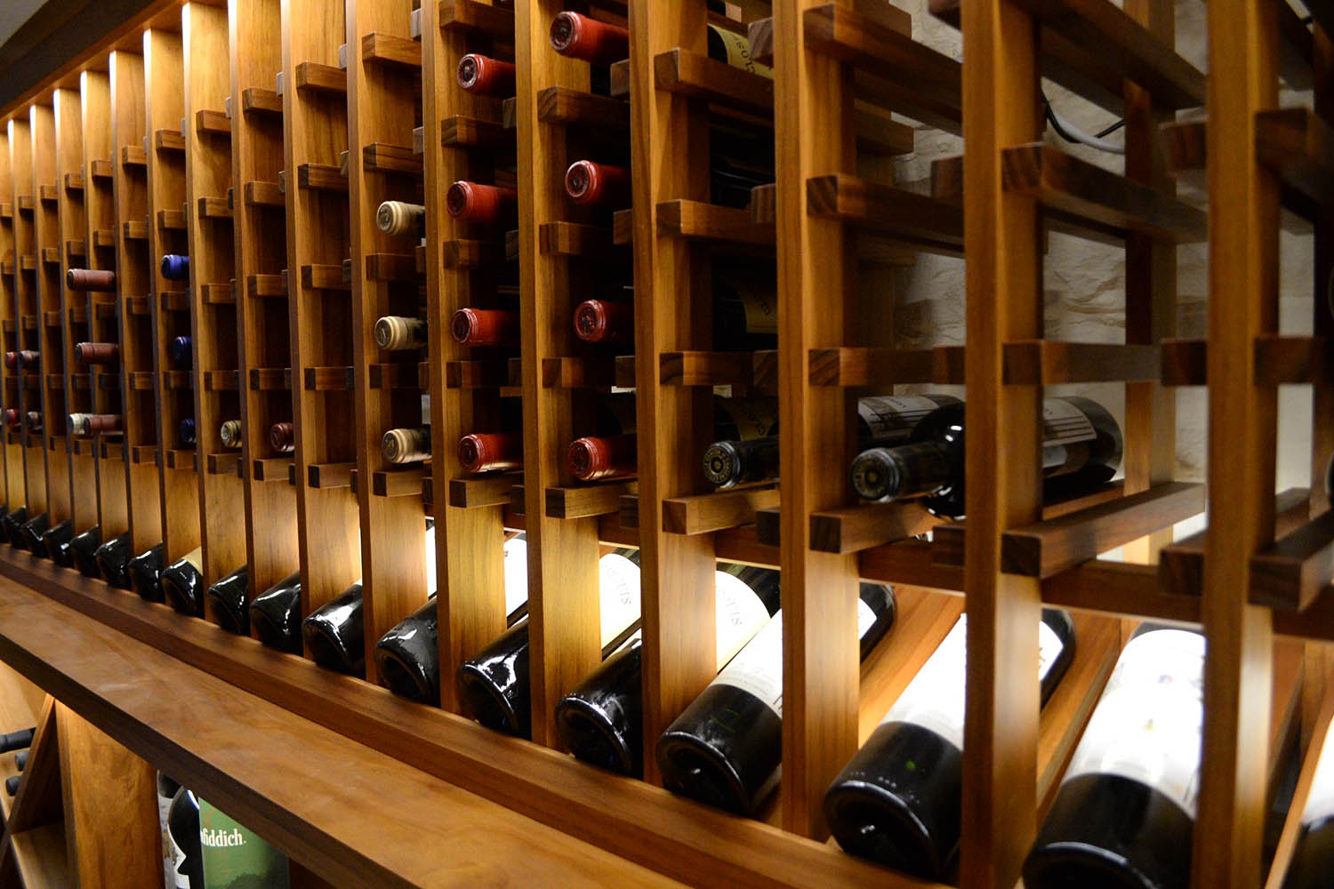 Closeup of wine cellar with integrated lighting, Shropshire